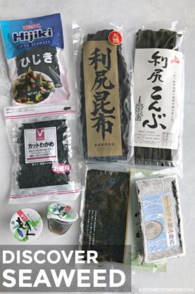 Various kinds of seaweed presented on the table, including nori, wakame, hijiki, and kombu.
