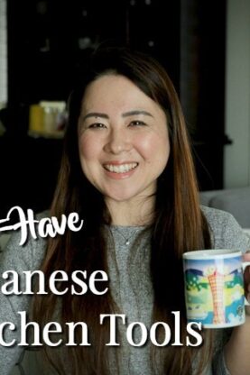 lady holding a mug sitting on chair