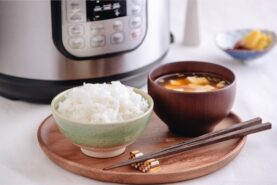 Perfectly cooked rice served in a rice bowl along with miso soup.