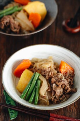Pressure Cooker Instant Pot Nikujaga (Japanese Meat and Potato Stew) in a white bowl.