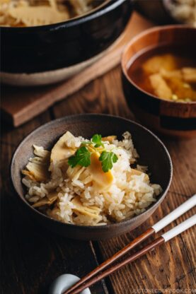 Bamboo rice in a bizen Japanese rice bowl and in a donabe (Japanese clay pot).