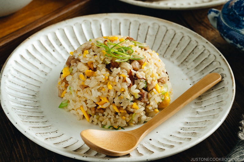 Chashu fried rice on a white plate.