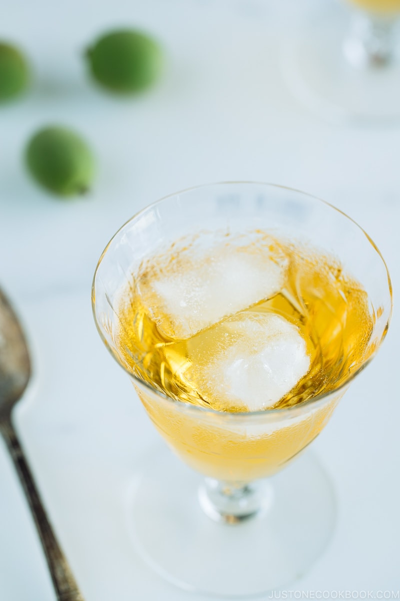 Japanese plum wine (umeshu) in a crystal glass.