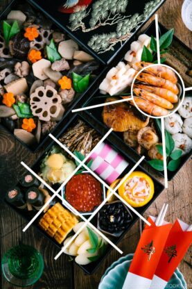 Osechi ryori in 3 tier boxes.