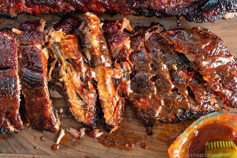 Smoked baby back ribs with bbq sauce.