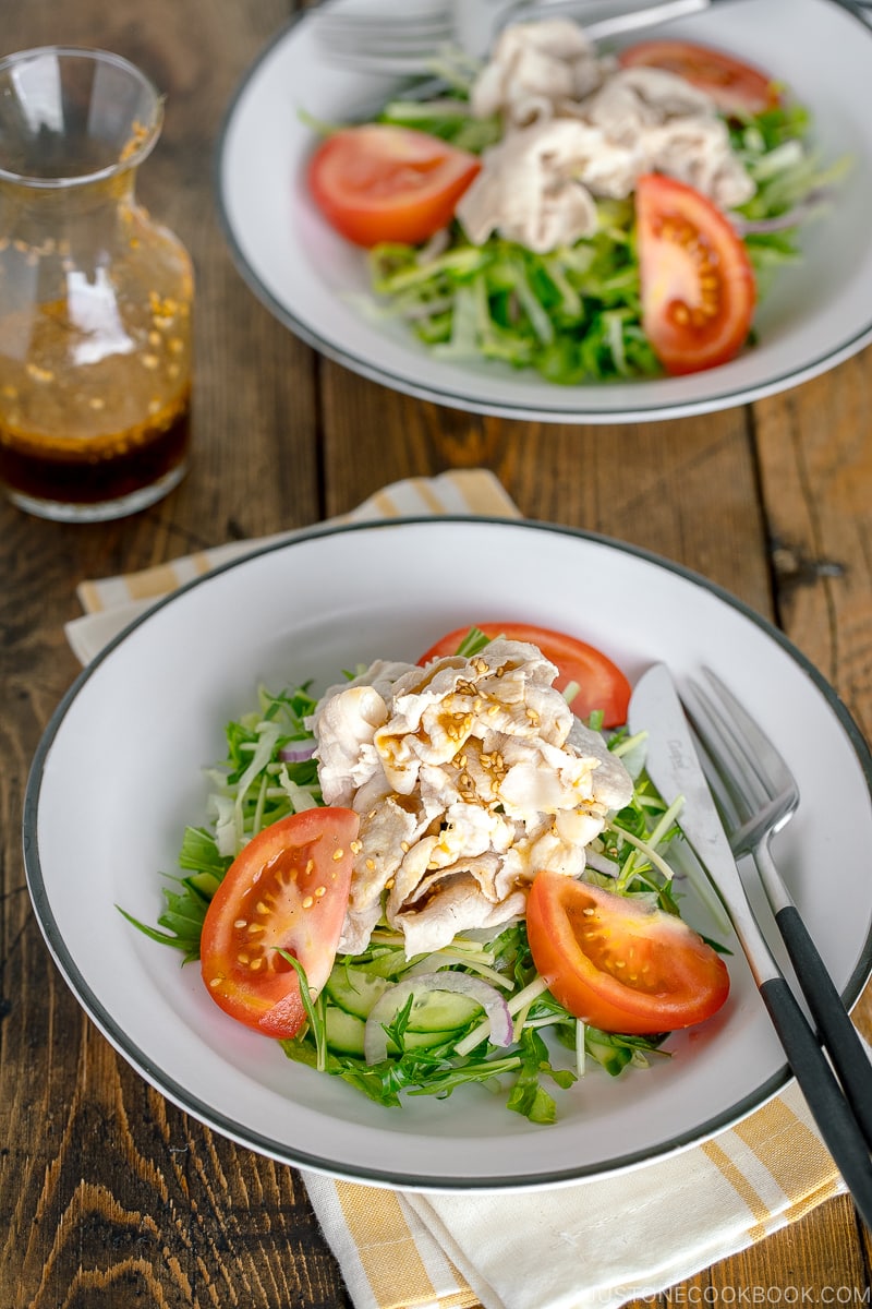 A white dish containing Shabu Shabu Salad.