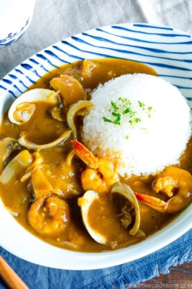 A plate containing Japanese seafood curry made with pressure cooker.