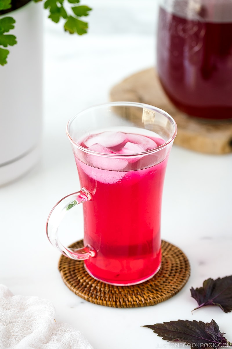 A glass containing Aka Shiso Juice.
