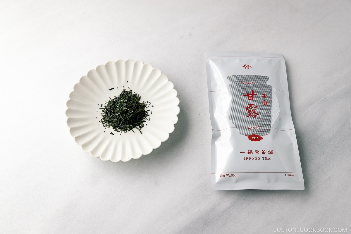 Kanro green tea leaves on a marble table