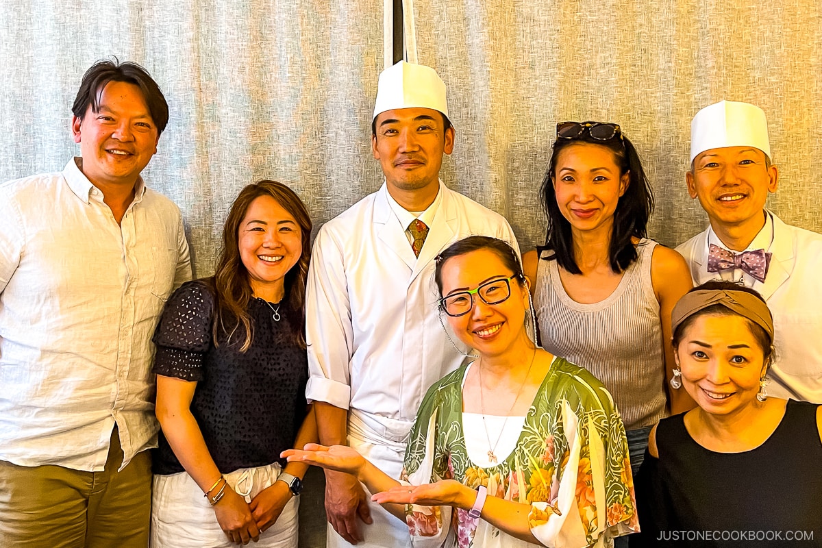 6 adults in a picture