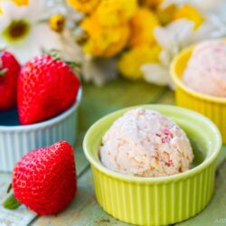 Ramekins containing strawberry ice cream.