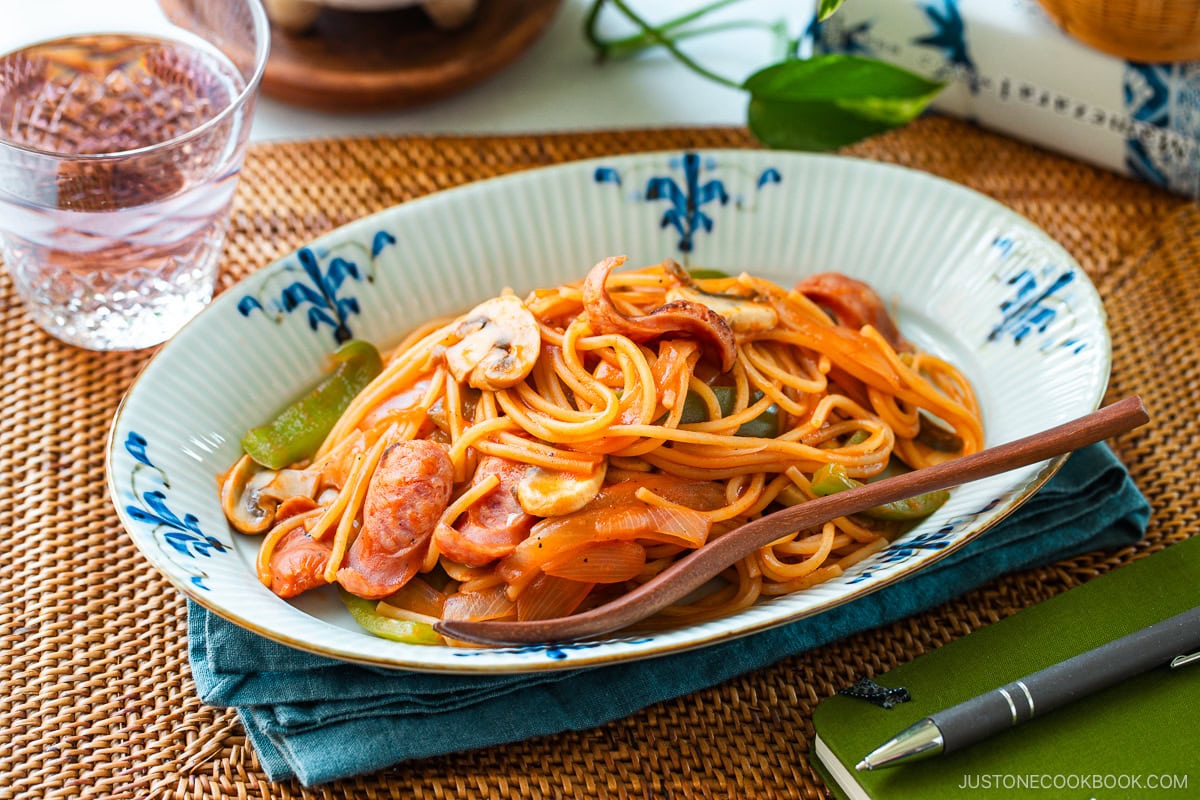 An oval plate containing Napolitan (Japanese Ketchup Spaghetti).