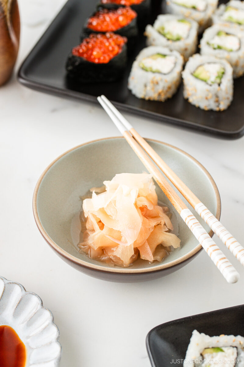 Pickled Sushi Ginger is presented in a white ceramic bowl.