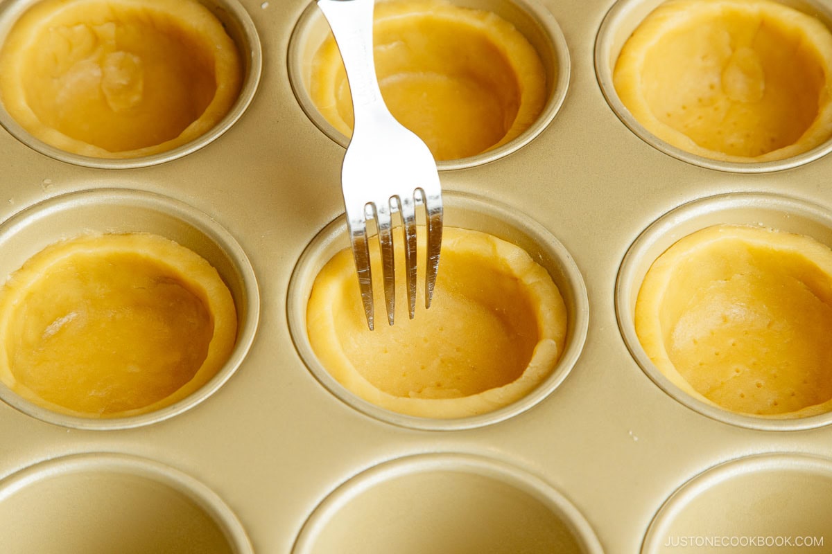 Poke the pastry with a fork.