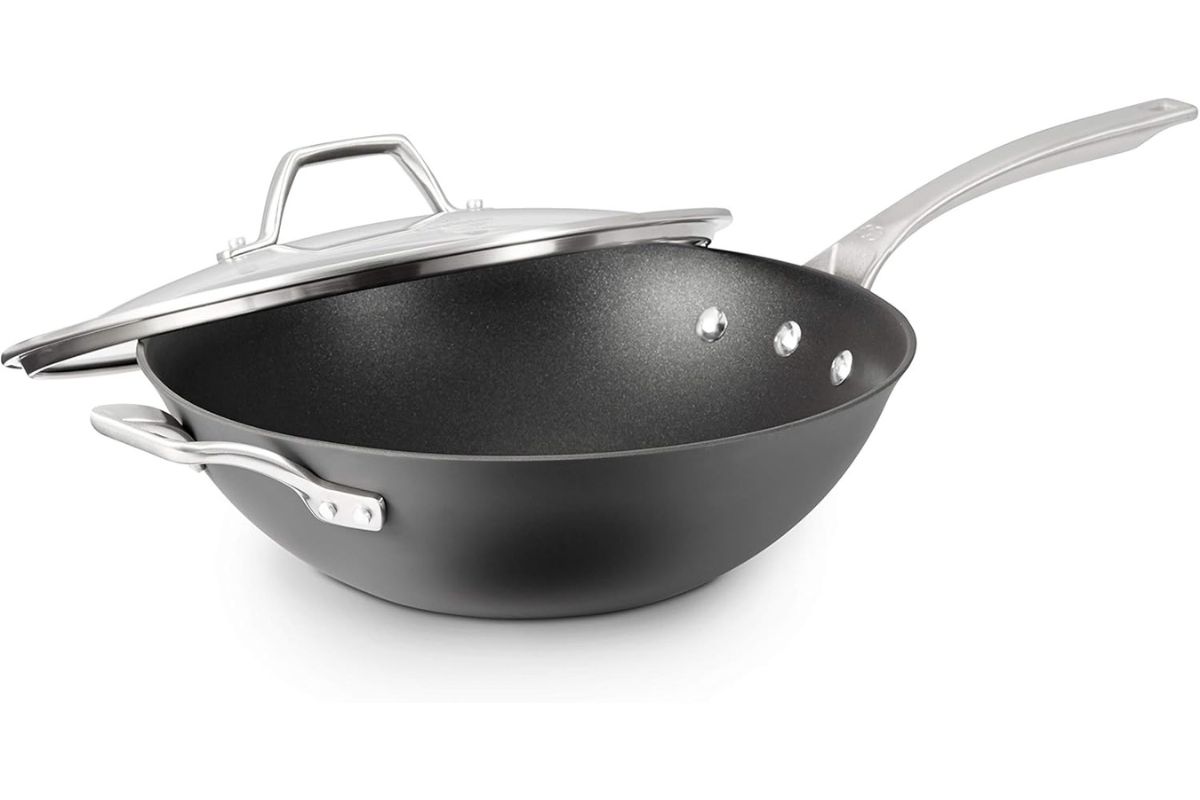 Non-stick frying pan with lid for Japanese cooking and meal preparation.