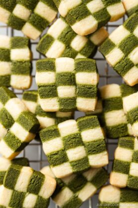 Matcha Checkerboard Cookies on a wire rack.