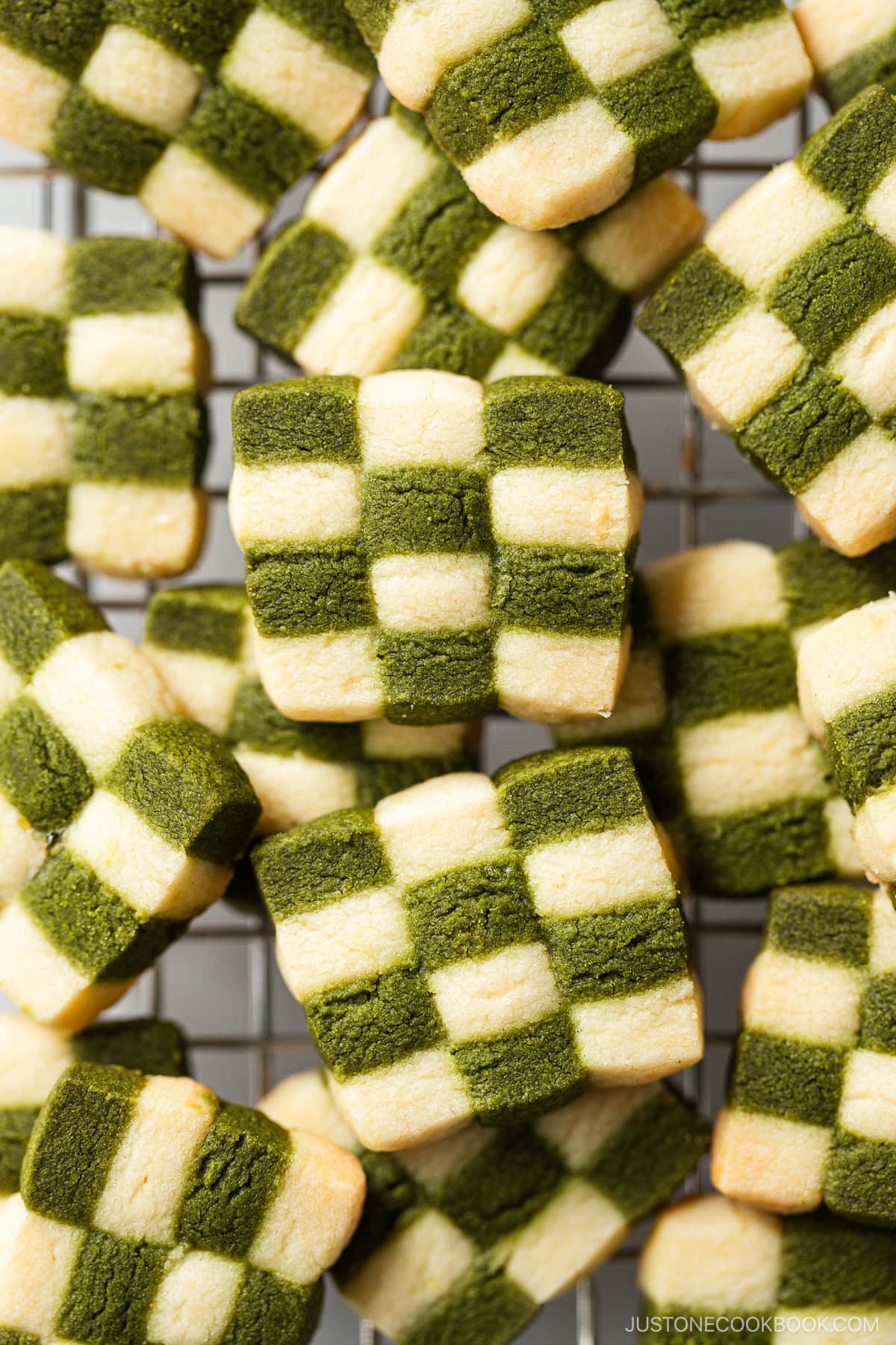 Matcha Checkerboard Cookies on a wire rack.