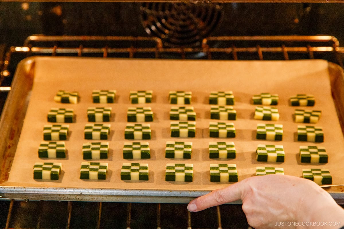 Bake the cookies in the oven.