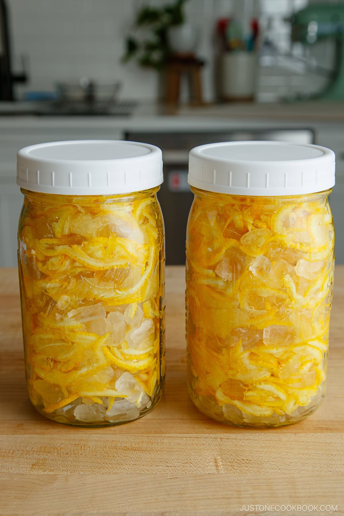 Two mason jars filled with yuzu cha (citron tea).