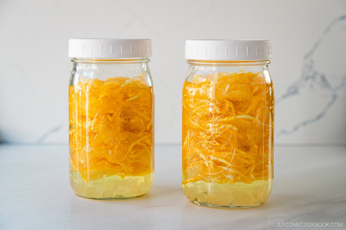 Two mason jars filled with yuzu cha (citron tea).