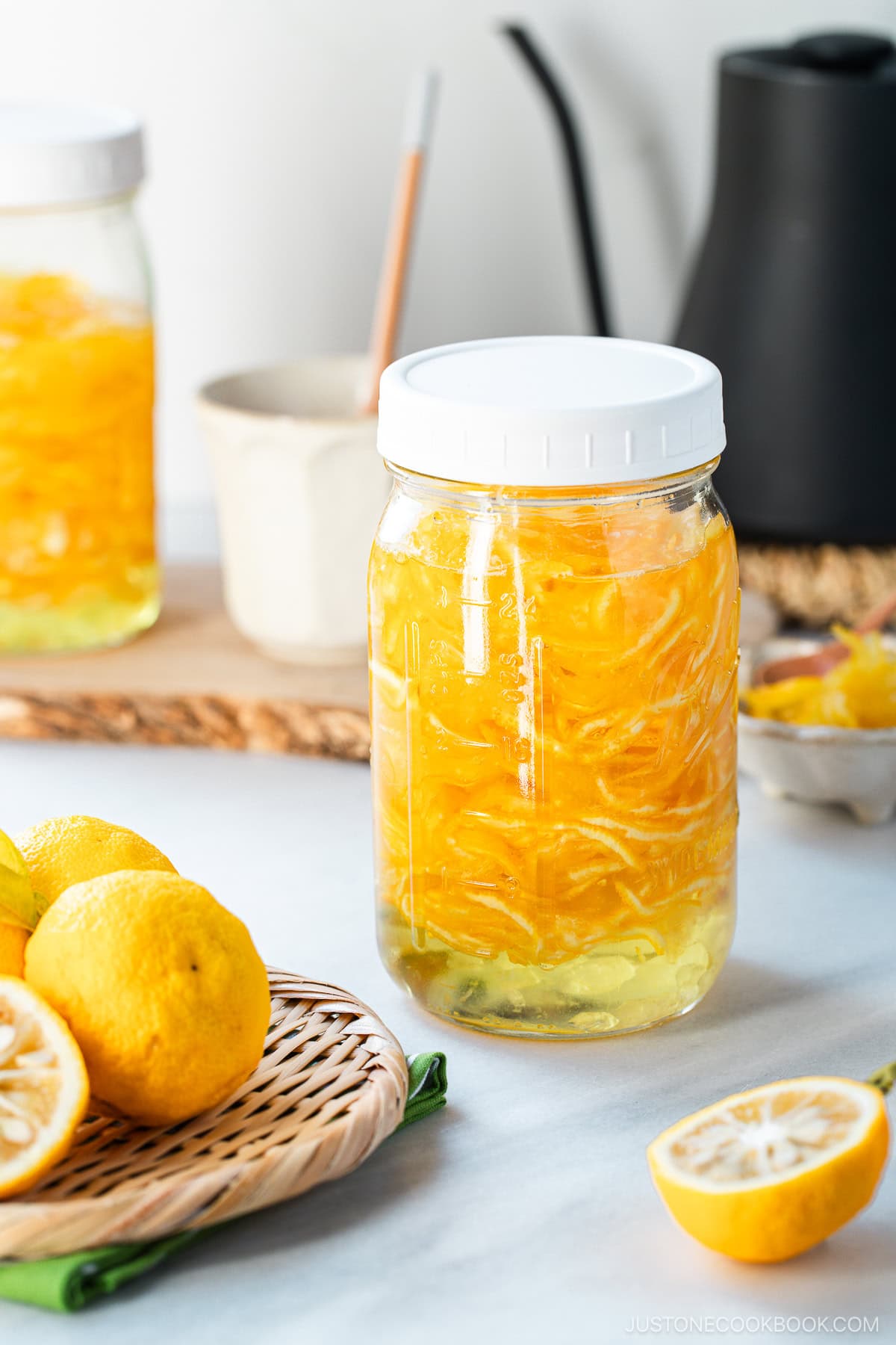 Two mason jars filled with yuzu cha (citron tea).