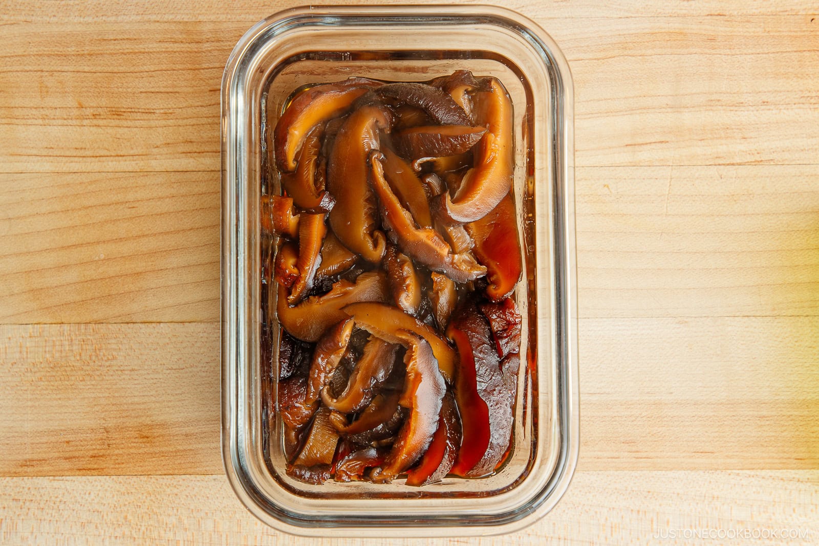 Soak the cooked mushrooms in the warm cooking broth.