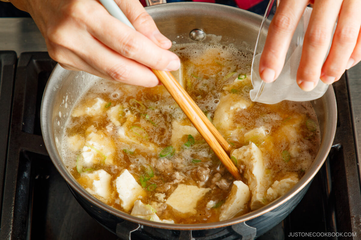 Stir to distribute the slurry.