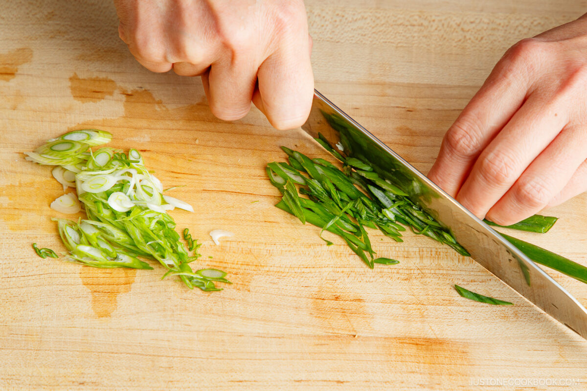 Slicing the green onions.