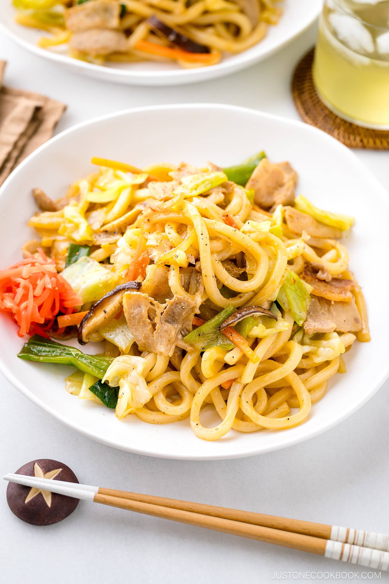 In my delicious Yaki Udon, we pan-grill thick and chewy Japanese wheat noodles with crisp vegetables and protein in a savory sauce. This popular udon dish is incredibly satisfying and ready in just 25 minutes. It's easily vegetarian or vegan adaptable, too.