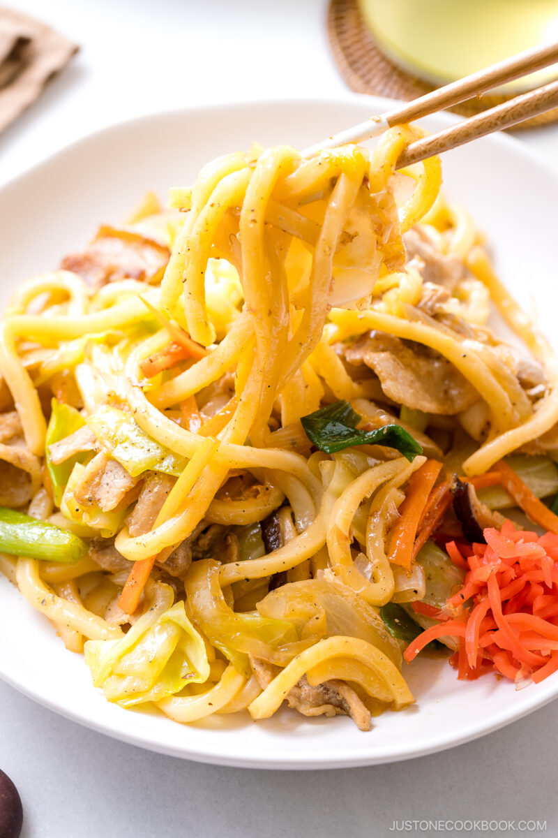 In my delicious Yaki Udon, we pan-grill thick and chewy Japanese wheat noodles with crisp vegetables and protein in a savory sauce. This popular udon dish is incredibly satisfying and ready in just 25 minutes. It's easily vegetarian or vegan adaptable, too.