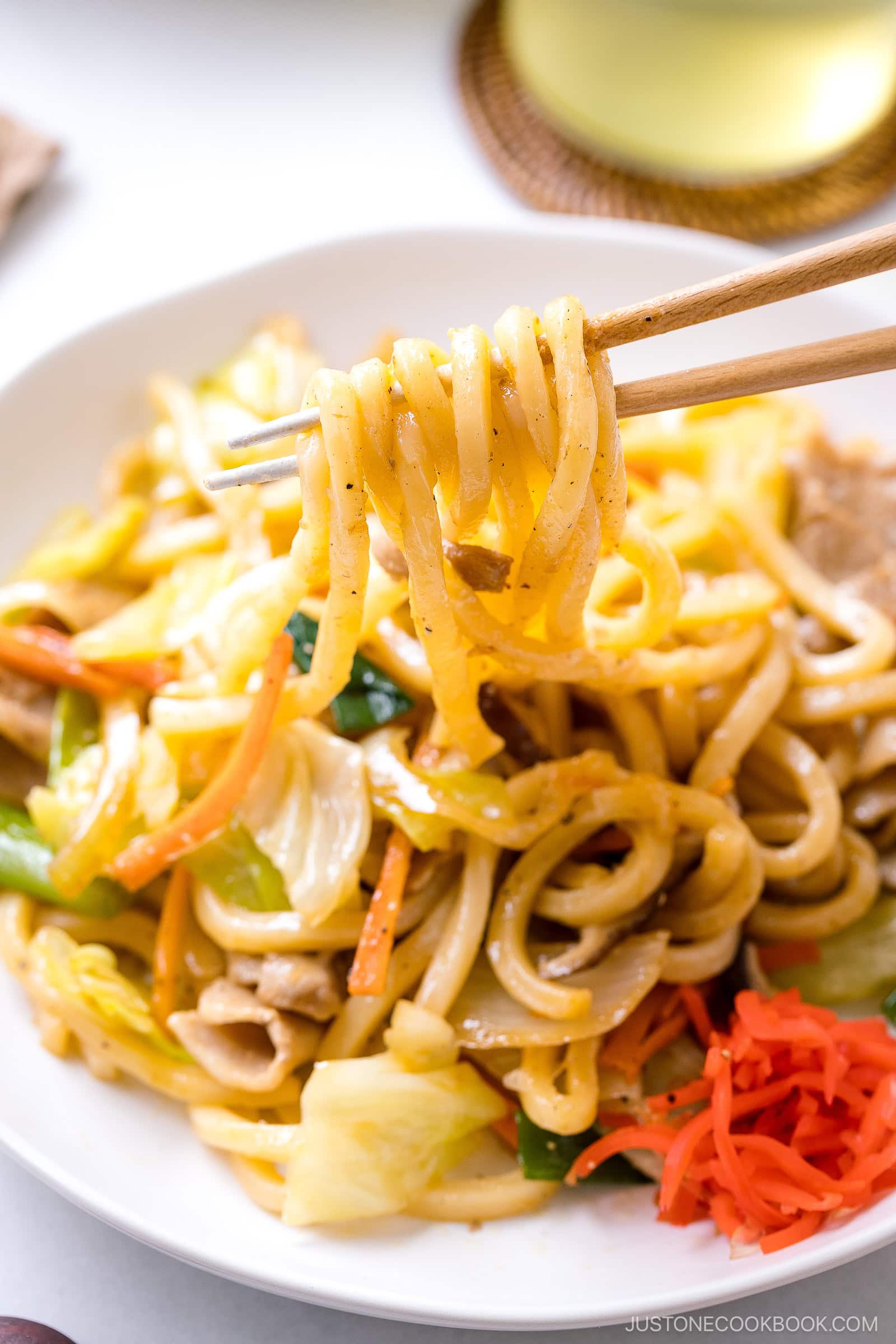 In my delicious Yaki Udon, we pan-grill thick and chewy Japanese wheat noodles with crisp vegetables and protein in a savory sauce. This popular udon dish is incredibly satisfying and ready in just 25 minutes. It's easily vegetarian or vegan adaptable, too.
