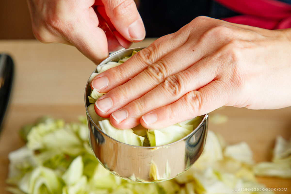 Measure using the cup or a scale.