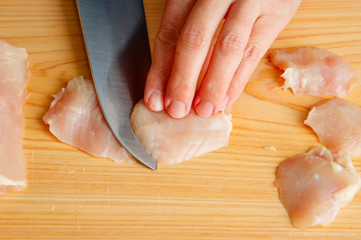 Cut the chicken in a slanted angle with a sharp knife.