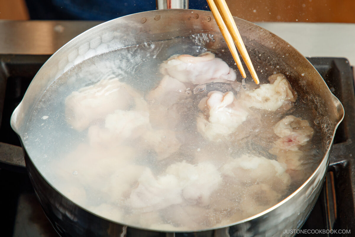 Blanch the offal in boiling water.