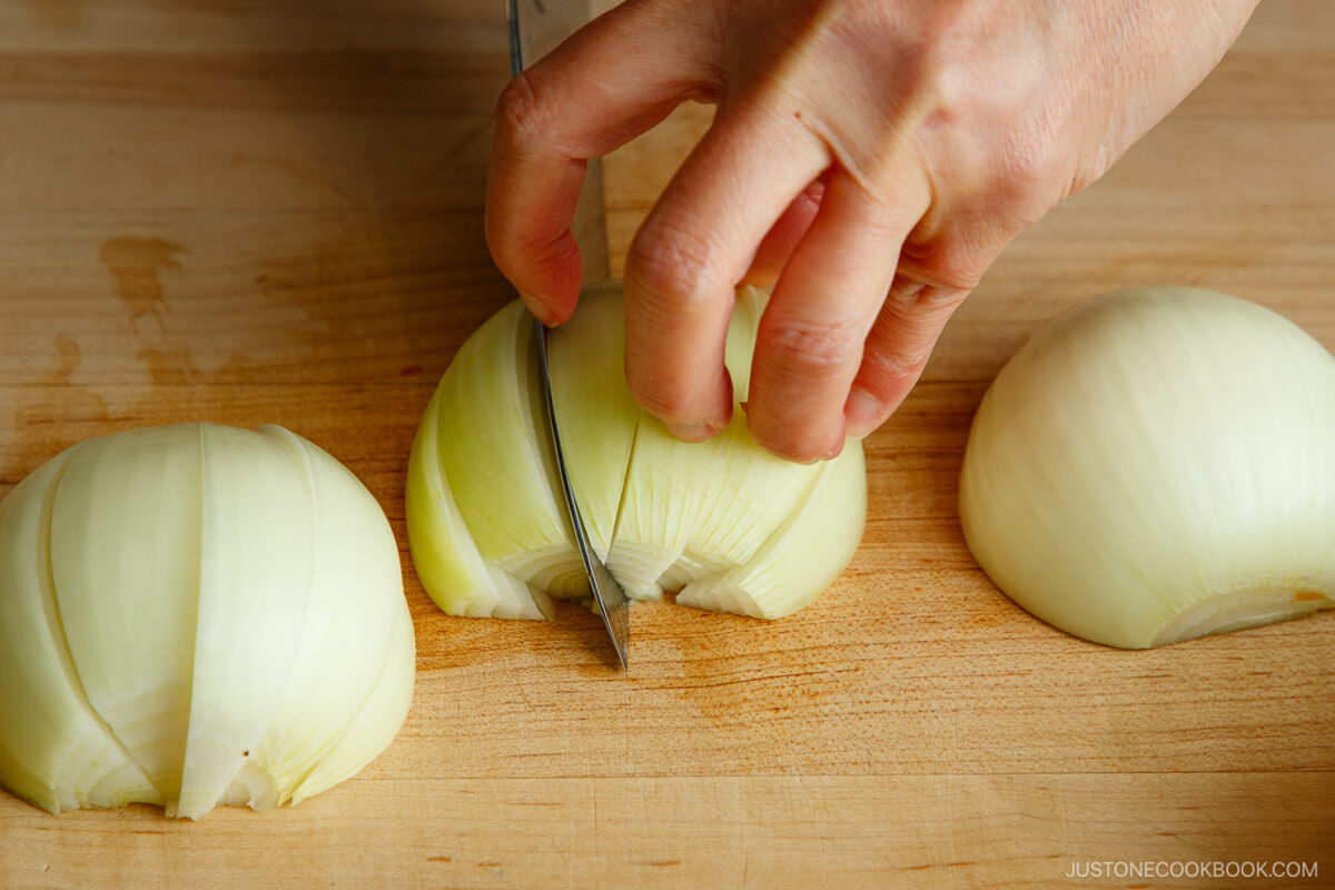 Cut the onion into wedges.