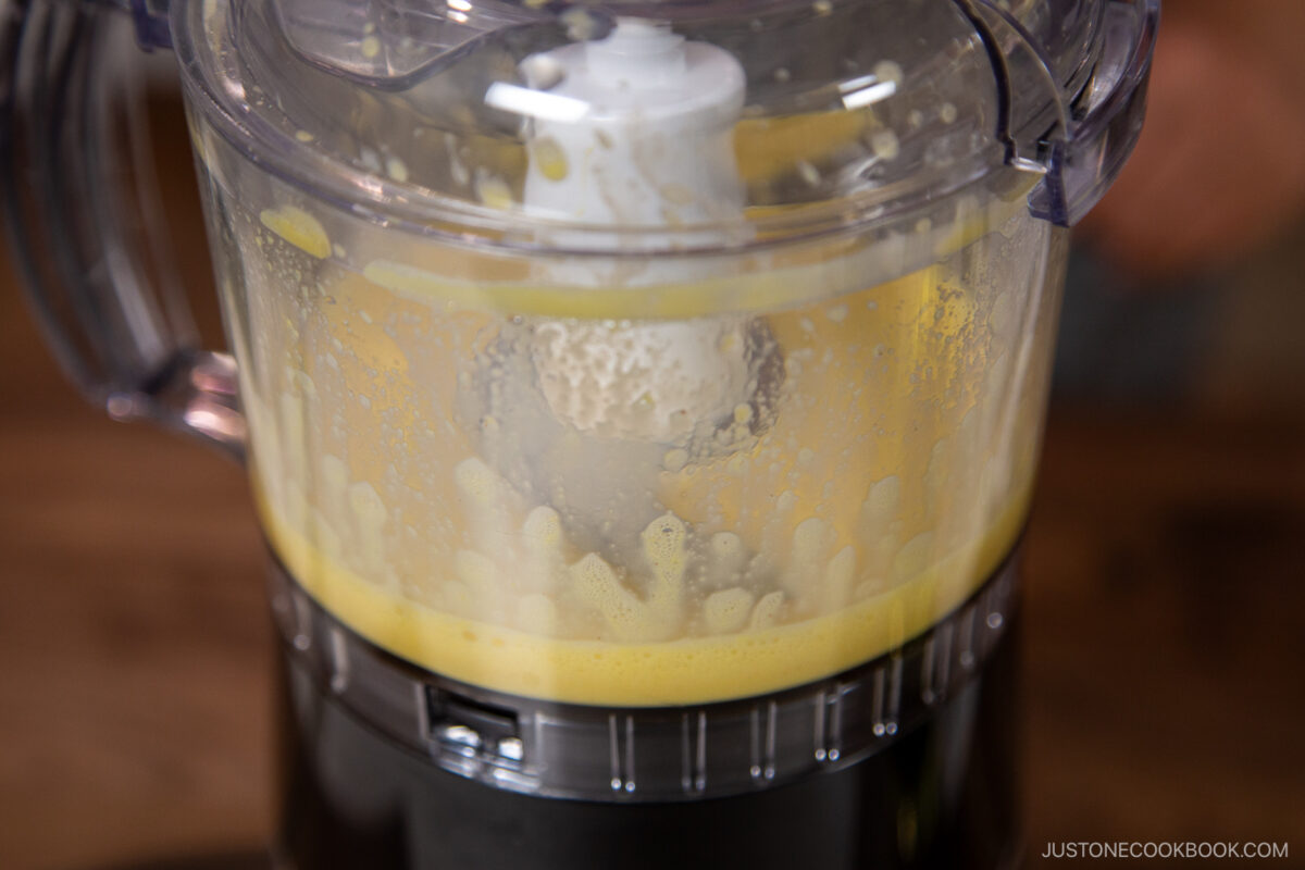 Keep the food processor running on the Stir setting.