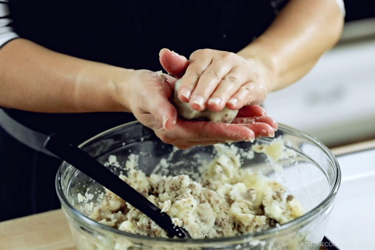 Forming the mixture into an oval shape.