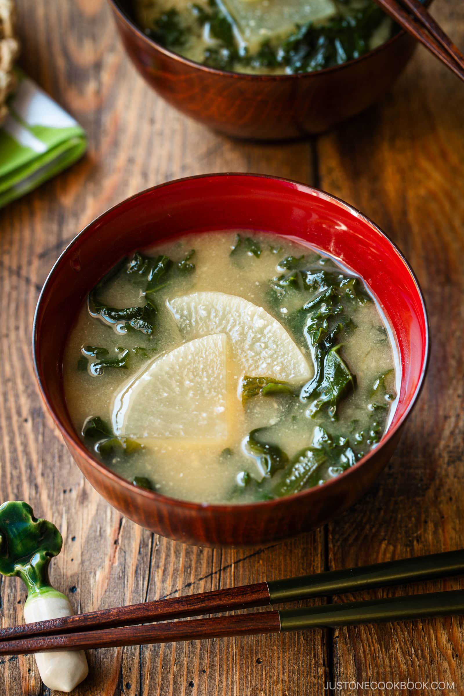 Lacquerer miso soup bowls containing Kale Daikon Miso Soup.