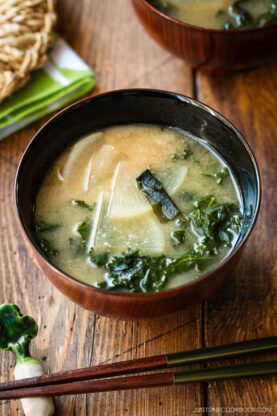 Lacquerer miso soup bowls containing Kale Daikon Miso Soup.