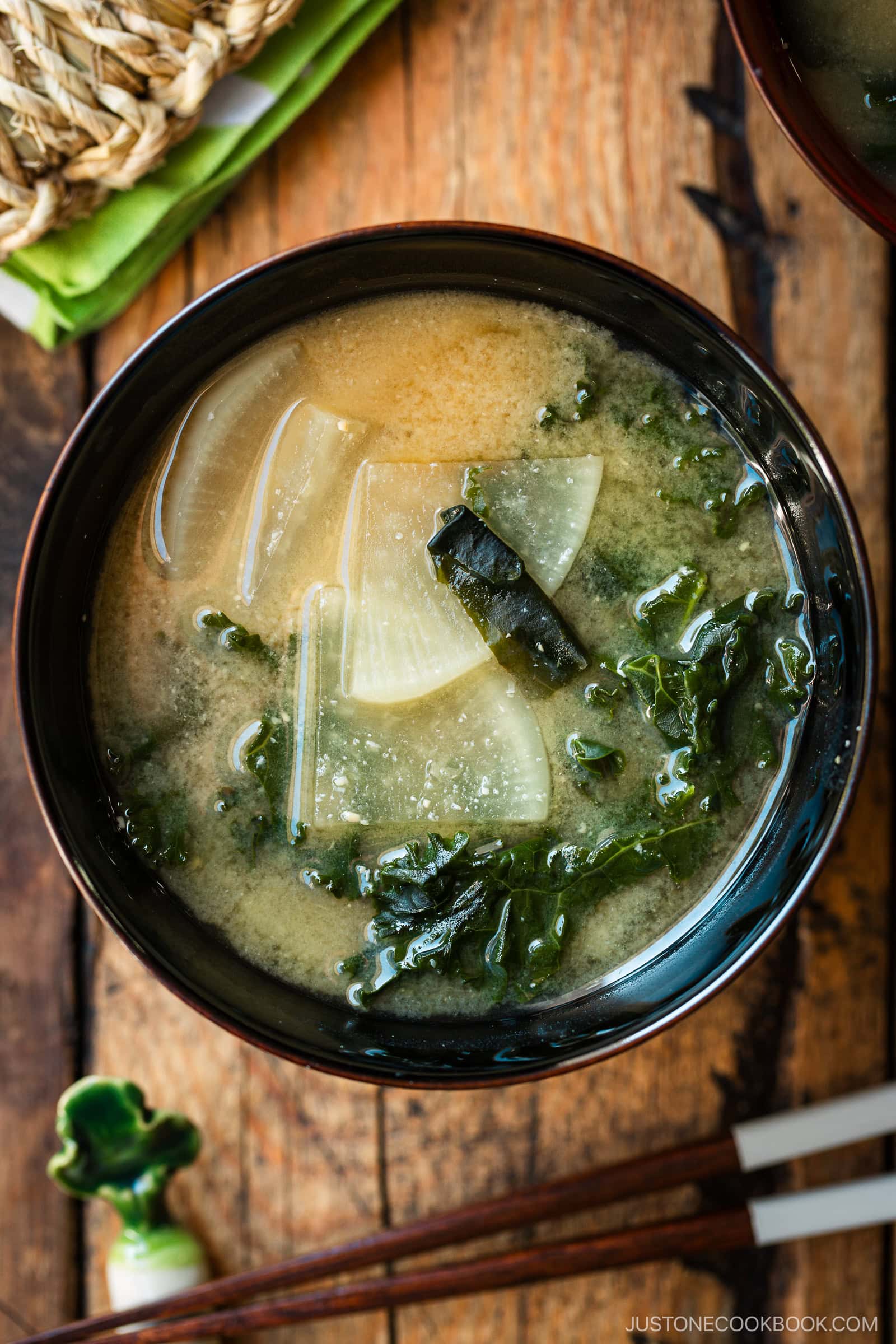 Lacquerer miso soup bowls containing Kale Daikon Miso Soup.