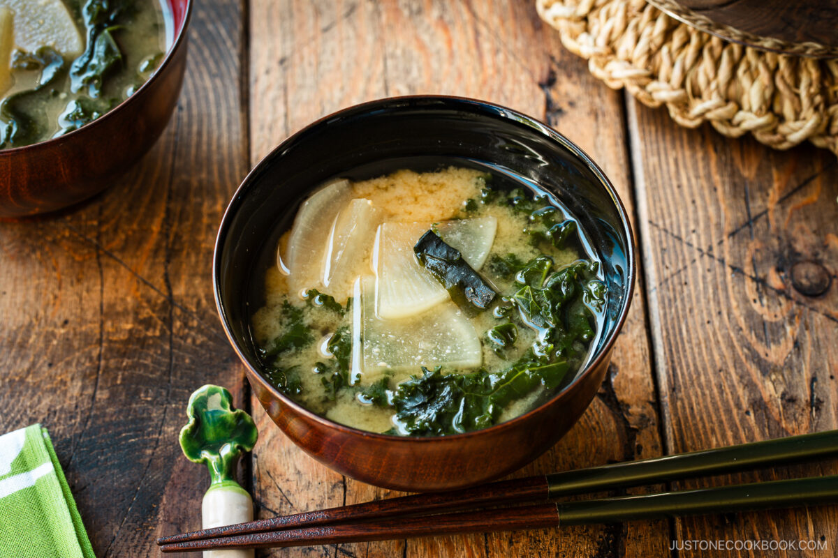 Lacquerer miso soup bowls containing Kale Daikon Miso Soup.