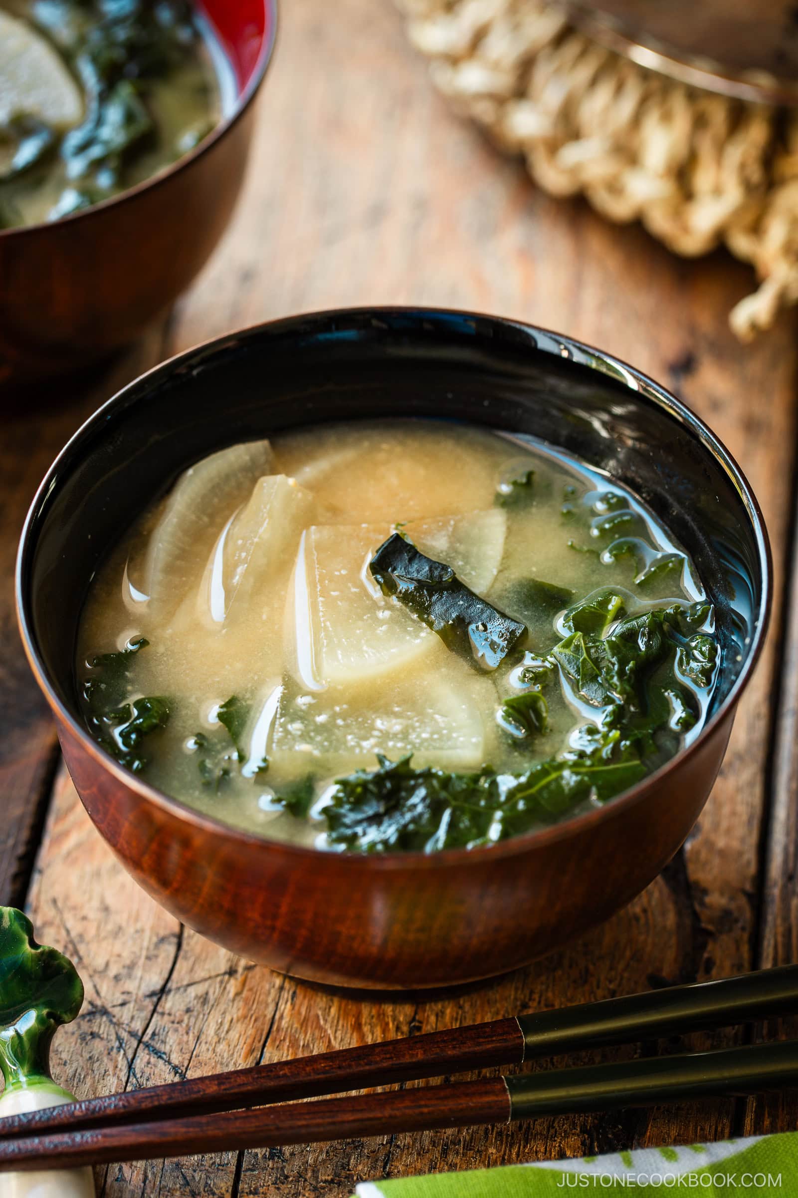 Lacquerer miso soup bowls containing Kale Daikon Miso Soup.
