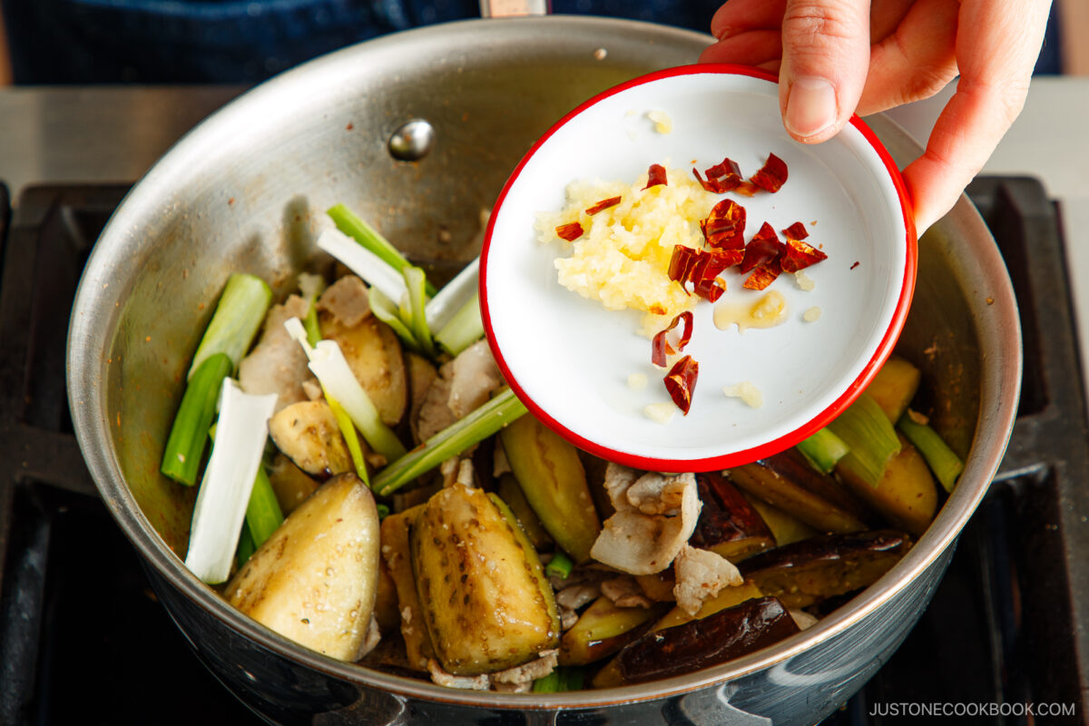 Add the garlic and chili flakes.