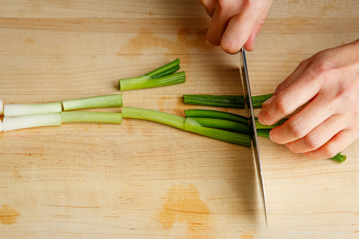 Cut the green onions.