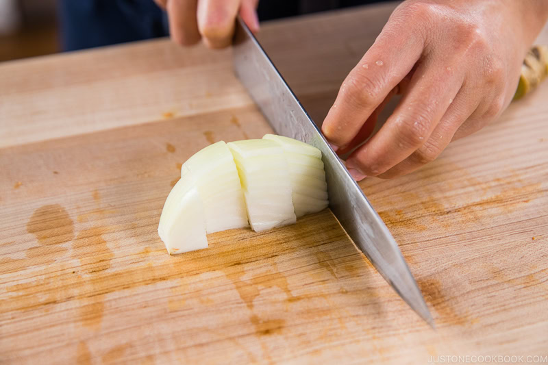 Cut the onion into smaller pieces.
