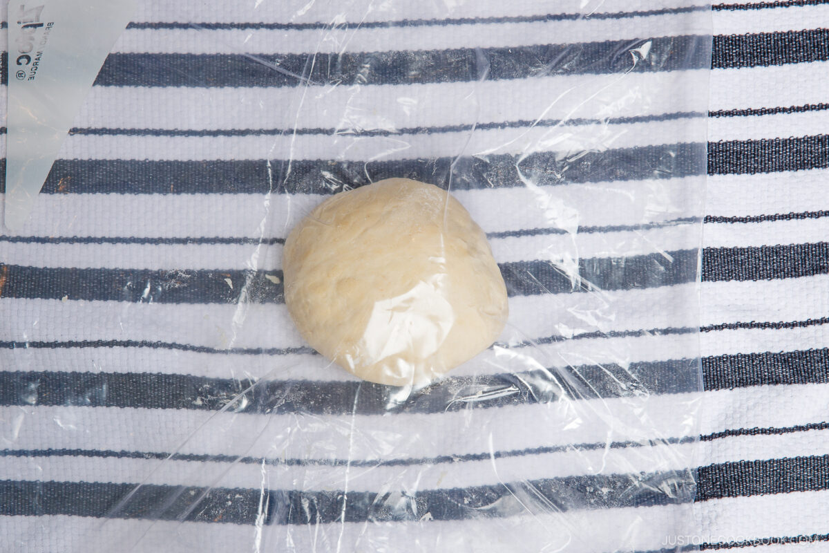 Gather the dough into a ball and keep kneading.