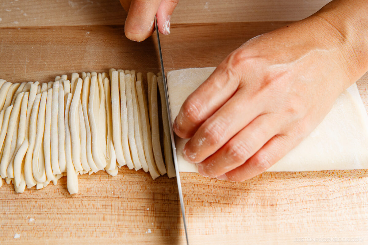Cut it into ⅛-inch (3 mm) noodles with a sharp knife.