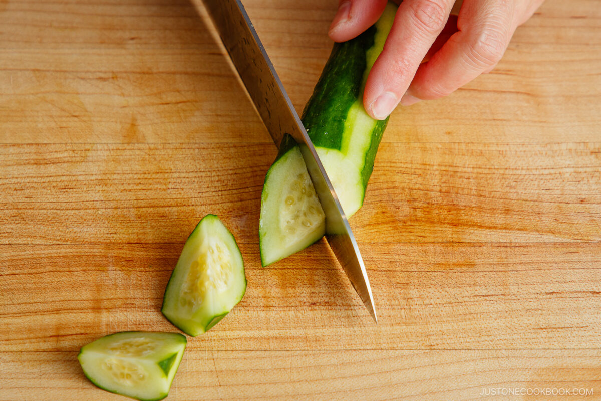 Cutting cucumber in rangiri Japanese cutting technique.
