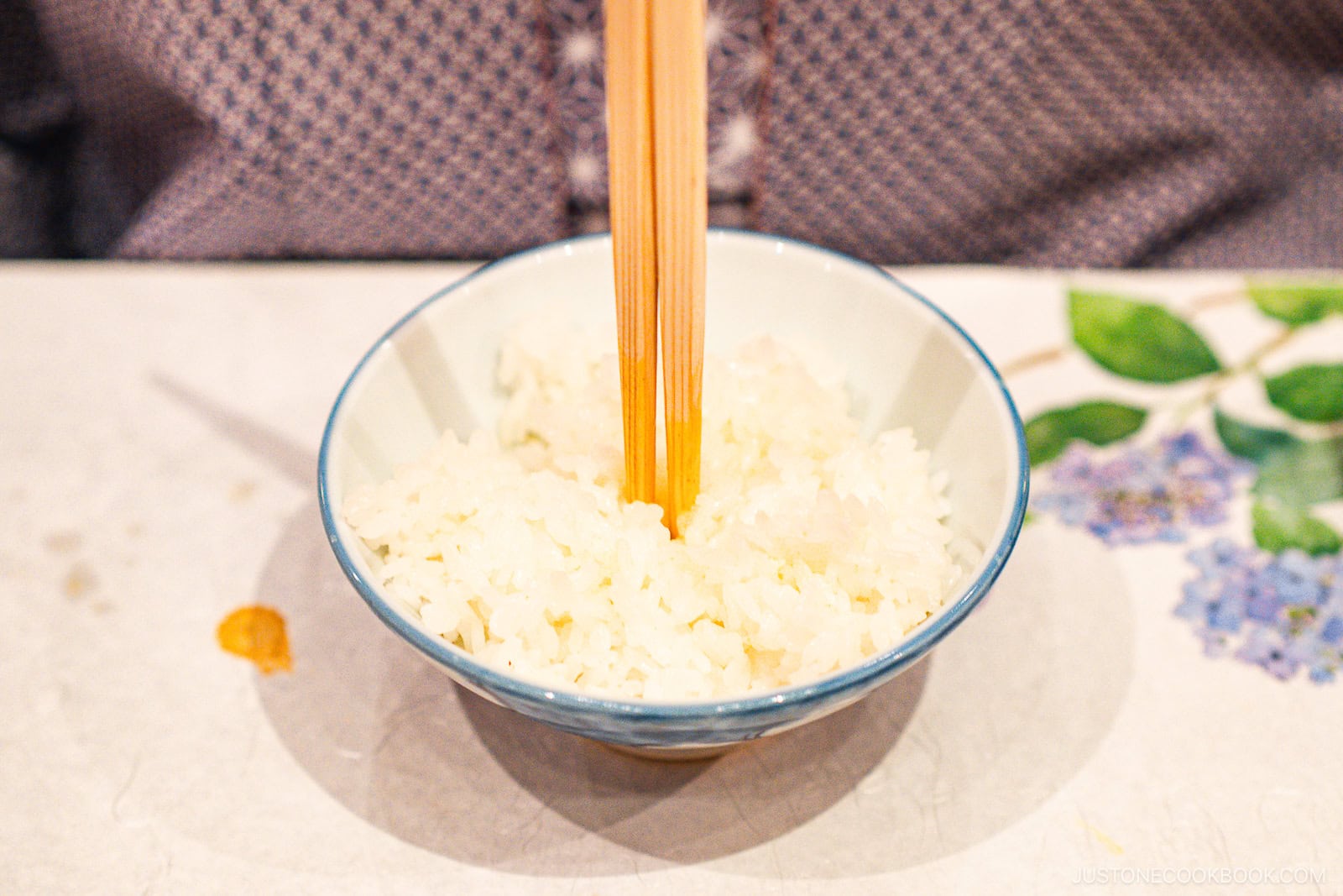 stick your chopsticks into your rice