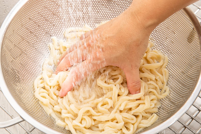 Rinsing under cold water.